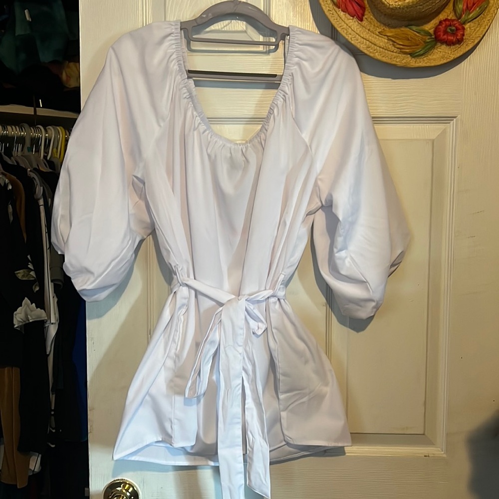 Off shoulder white tunic with belt